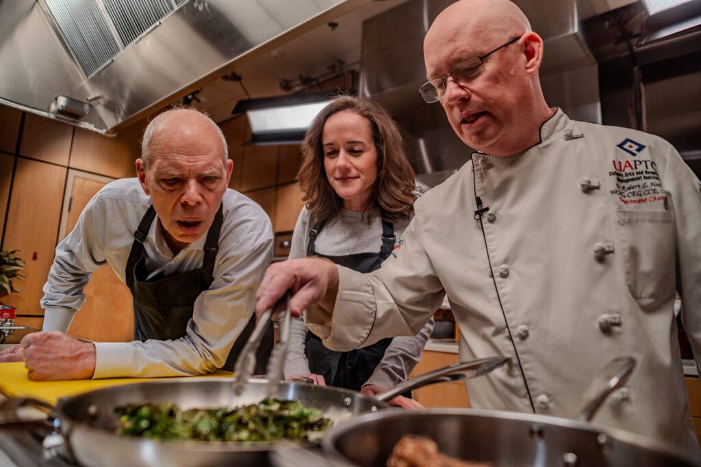 Craig O'Neill, Alyssa Frisby, Robert Hall are cooking