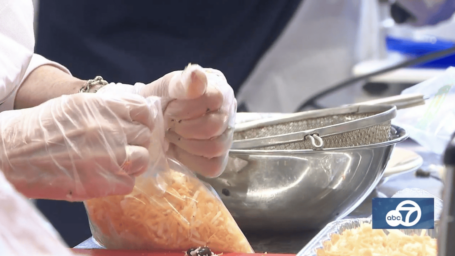 close up shot of a person opening ingredient bags