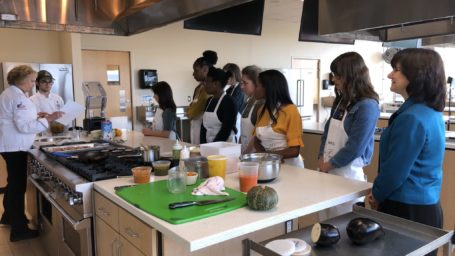 culinary class in a demonstration kitchen